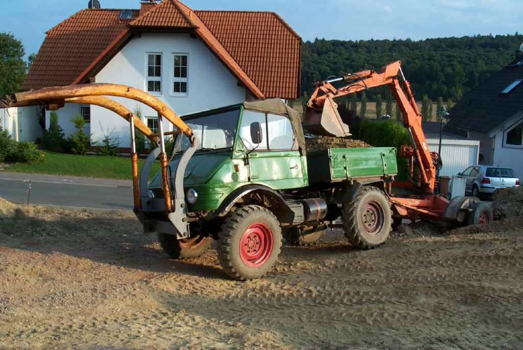 421 mit Frondlader und ATLAS-Lader auf Fahrgestell